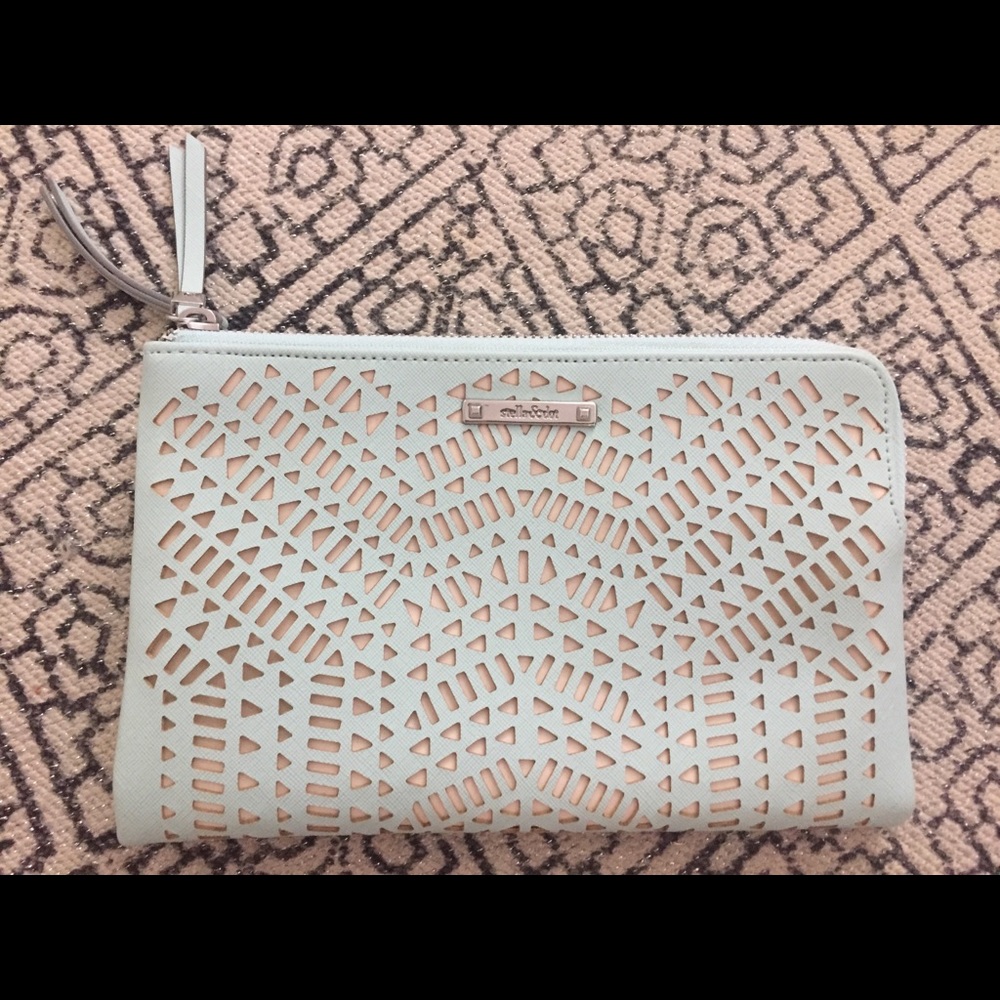 Soft mint perforated double clutch